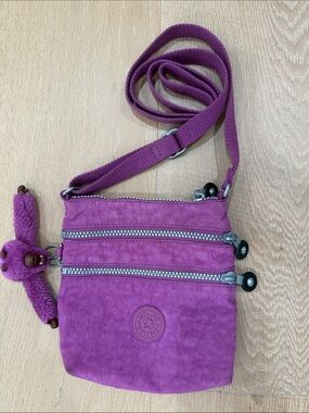 Kipling Magenta/Purple Crossbody Bag with Plush Monkey Charm